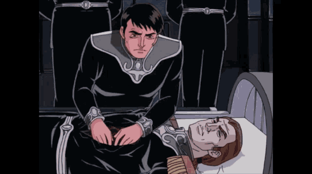 a man in a black uniform is standing next to a man in a black uniform laying in a bed