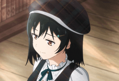 a close up of a girl wearing a hat
