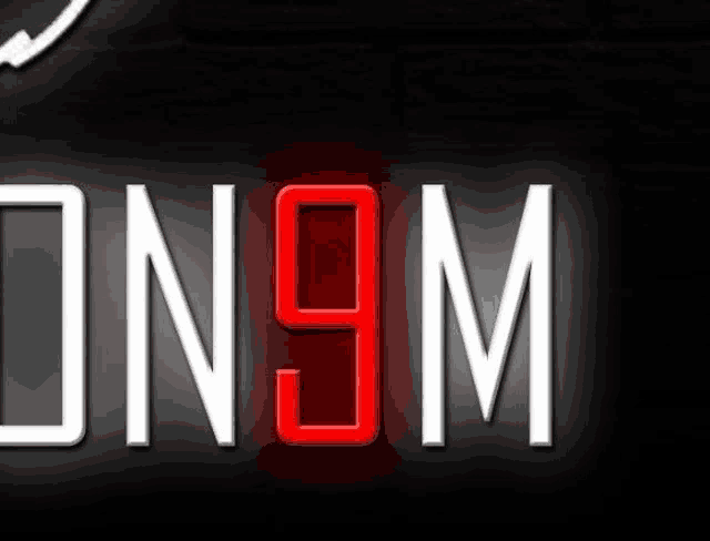 a black background with white letters and red letters that say on9m