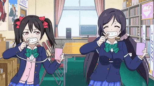 two anime girls are brushing their teeth in a library while holding cups .