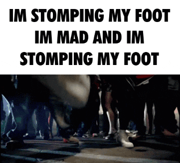 a group of people are stomping their feet in a video