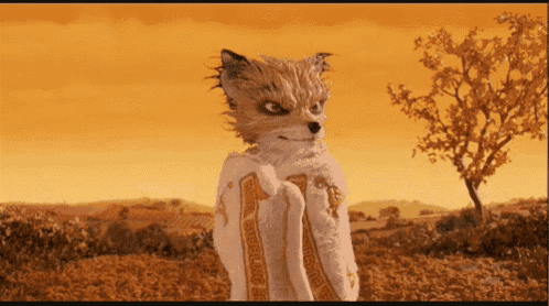a cartoon fox is wrapped in a white towel