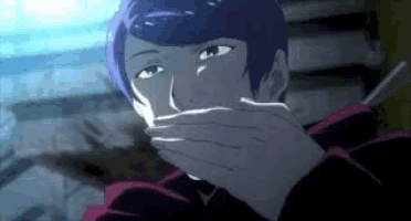 a man with purple hair is covering his mouth with his hands while smoking a cigarette .