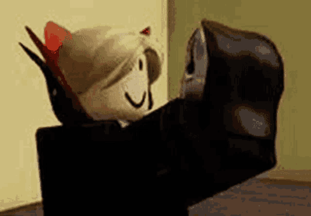 a roblox character is sitting in a chair with a ghost behind him .