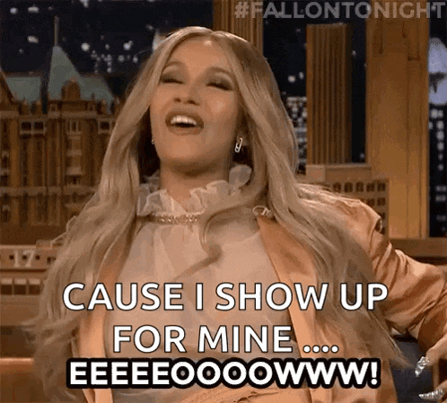a woman is laughing and saying cause i show up for mine ...