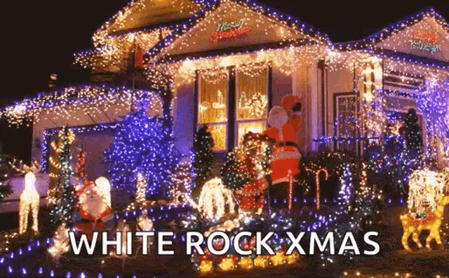 a house is decorated with lots of christmas lights and decorations