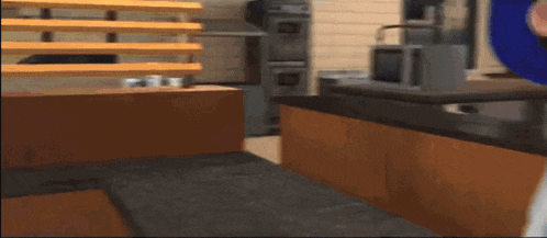 a person wearing white gloves is standing in a room