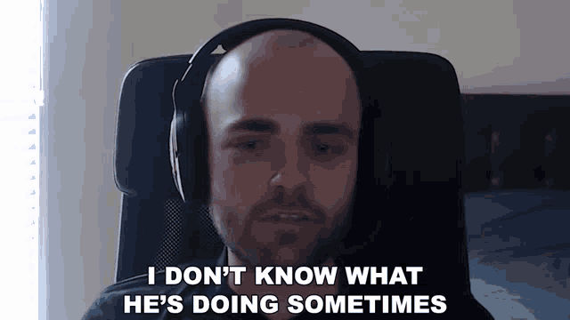 a bald man wearing headphones says i don t know what he 's doing sometimes