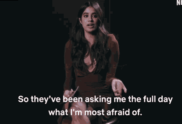 a woman in a red dress says so they 've been asking me the full day what i 'm most afraid of.