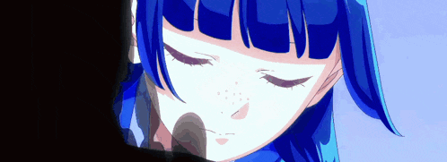 a close up of a blue haired anime girl with her eyes closed .