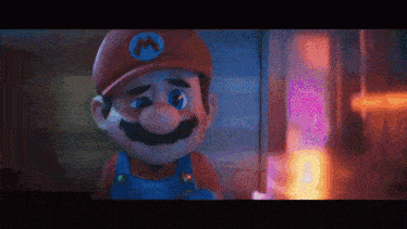 a close up of mario 's face with a m on his hat