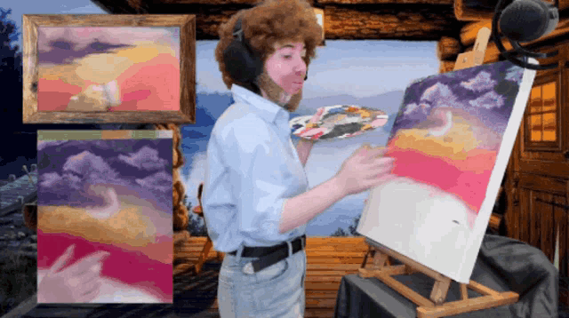 a man with a beard is painting a picture on a canvas