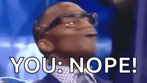 a man wearing glasses and a suit is making a funny face and saying `` you : nope ! ''