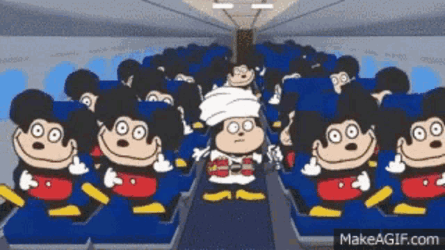 a bunch of mickey mouse cartoon characters are sitting on an airplane