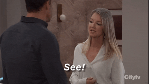a man and woman are standing next to each other and the woman is saying see