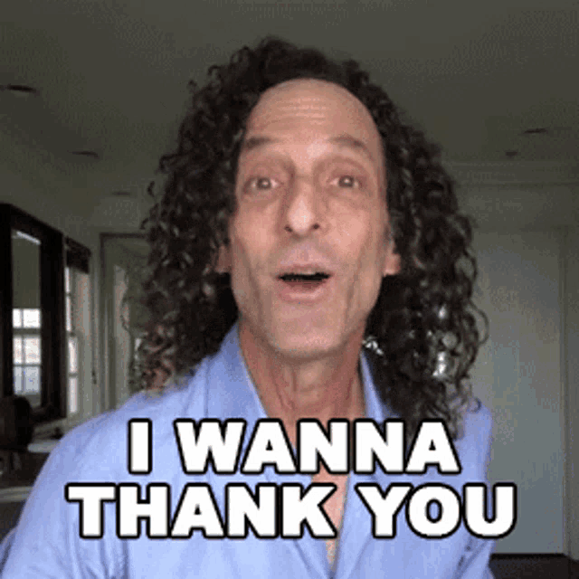 a man with curly hair is saying " i wanna thank you "