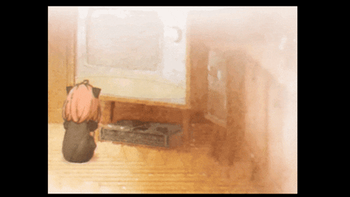a girl with pink hair is sitting in front of a stove