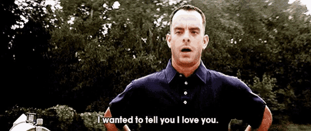 a man in a blue shirt is saying i wanted to tell you i love you