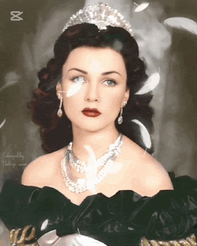 a woman wearing a tiara and a necklace with the words changed by vintage woman