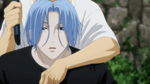 a man with blue hair is being held by another man in a black shirt