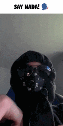 a man wearing a mask and sunglasses says " say nada " on the bottom