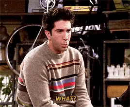 a man wearing a striped sweater is asking what
