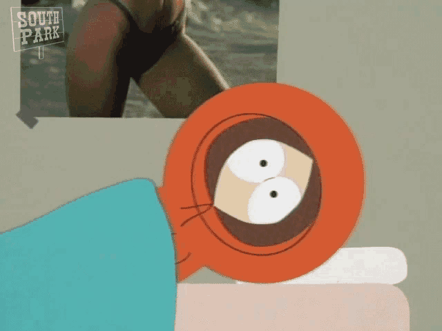 a cartoon character laying on a bed with a south park poster behind him