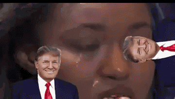 a man in a suit and tie is smiling in front of a woman 's face with tears coming out of her eyes .
