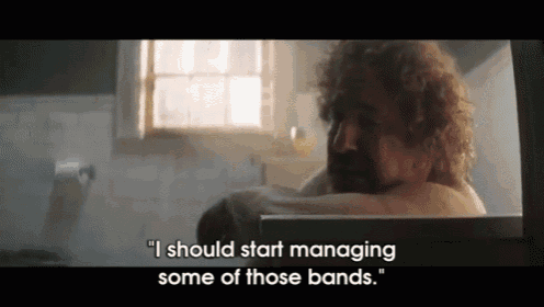 a man in a bathtub with the words " i should start managing some of those bands " below him