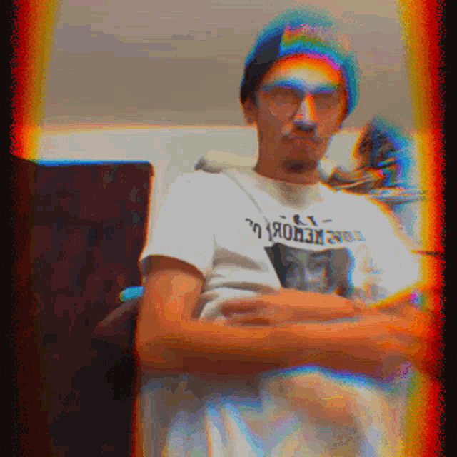 a pixelated image of a man wearing a t-shirt that says monkey