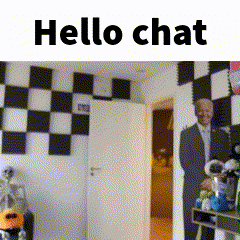 a man in a suit is standing in a room with checkered walls and the words hello chat