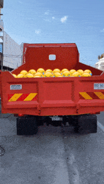 the back of a red truck with a license plate that says aa 8648