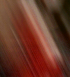 a blurred image of a person 's face with a pink and black background