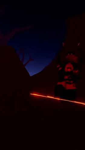 a person is standing in the middle of a dark room with a red light coming out of the ground .