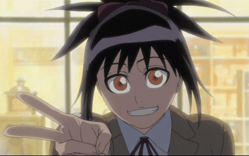 a girl with black hair and orange eyes is giving a peace sign