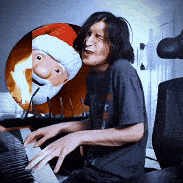 a man is playing a piano in front of a cartoon of santa claus