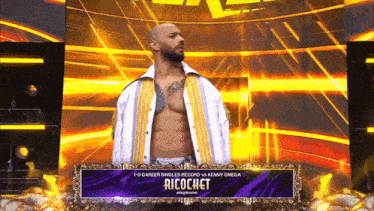 a wrestler named ricochet is on a stage