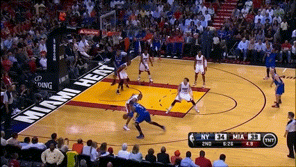 a basketball game is being played in front of a crowd and the score is 34 to 69