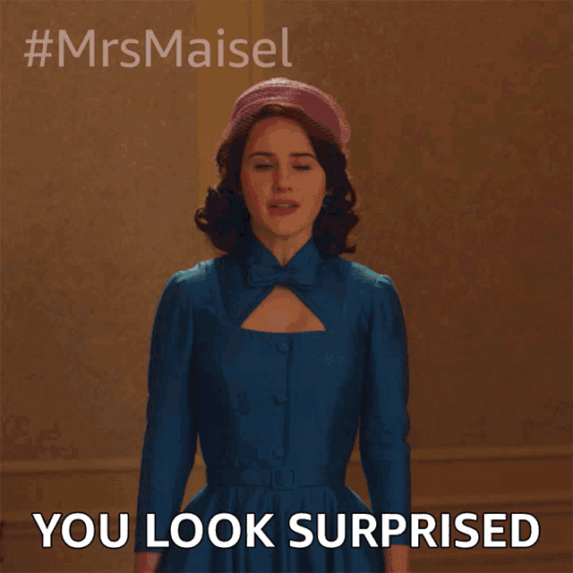 a woman in a blue dress with the words you look surprised below her