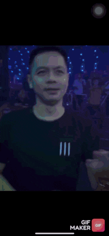 a blurry picture of a man with the word dyu on it .