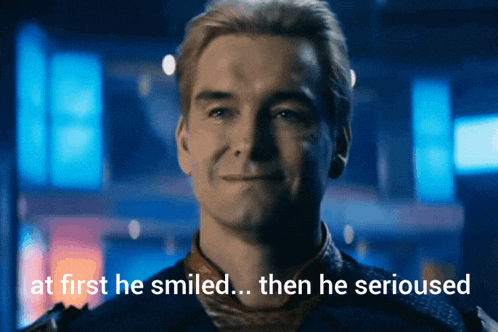 a man smiling with the words at first he smiled then he serioused