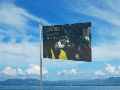 a flag that says ' trench ' on it is flying in the wind
