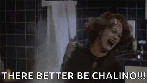 a woman is screaming in a shower with the words `` there better be chalino '' written on the bottom .