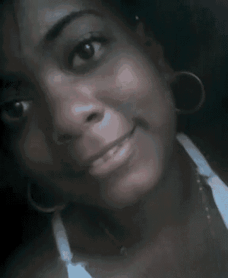 a close up of a woman 's face with a kiss on her lips