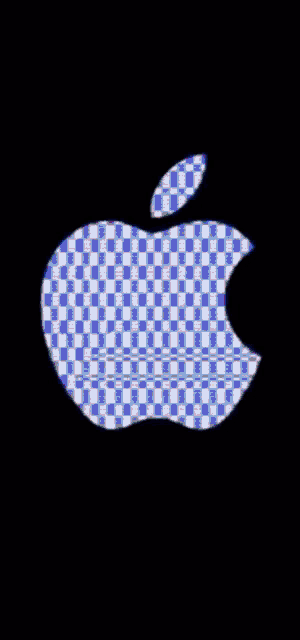 a colorful apple logo on a black background with a hole in the middle