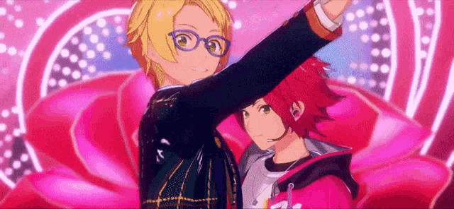 two anime characters are dancing on a stage .
