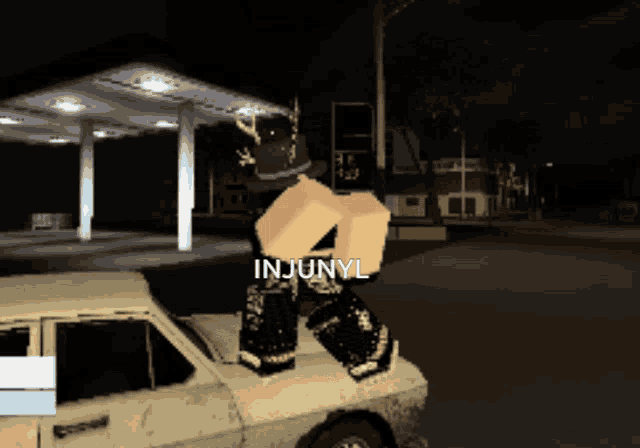 a person is standing on the roof of a car with the name injuryl written on it
