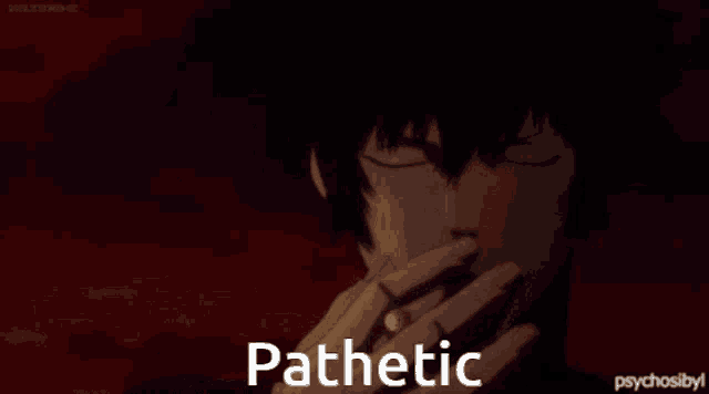 a man is smoking a cigarette and the word pathetic is on the bottom