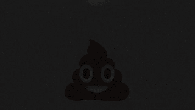 a brown poop with white eyes and a smile on it