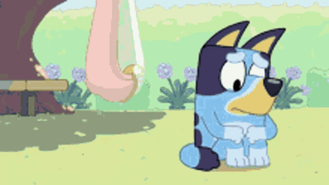 a cartoon dog with a sad look on his face is sitting in a park